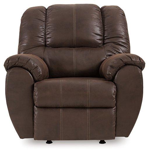 Comfortable Ashley Furniture McGann Recliner in a cozy living room setting with plush fabric and cushioned armrests.