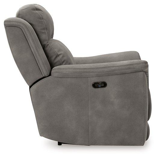 Ashley Furniture Next-Gen DuraPella Power Recliner with plush upholstery and adjustable headrest, designed for comfort and support.