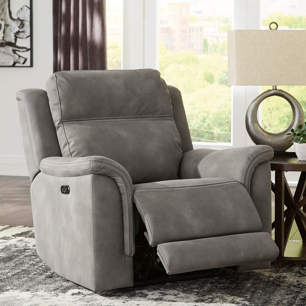 Next-Gen DuraPella Power Recliner by Ashley Furniture showing plush fabric upholstery and adjustable reclining mechanism.
