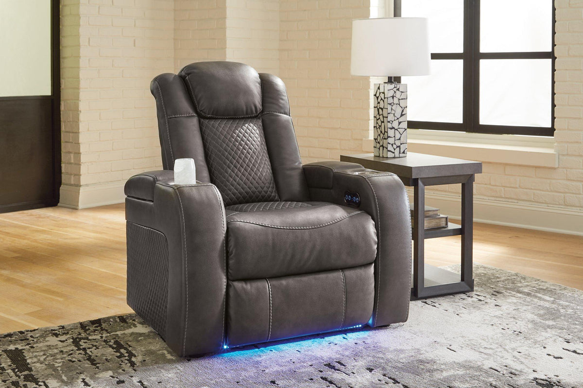 Ashley Furniture Fyne-Dyme Power Recliner with plush fabric and adjustable reclining feature, shown in a cozy living room setting.