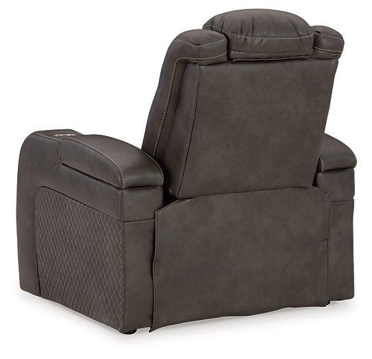 Ashley Furniture Fyne-Dyme Power Recliner with plush cushions and dark leather upholstery, designed for comfort and support.