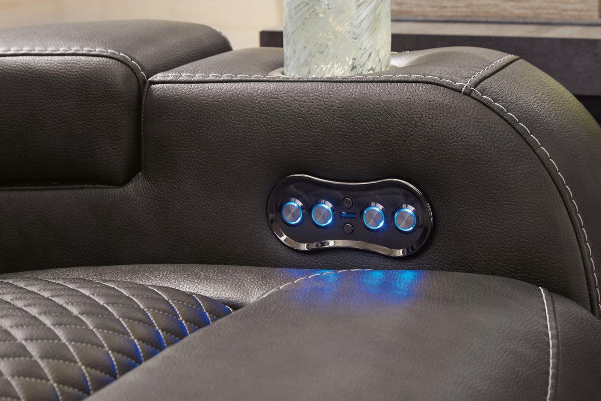 Ashley Furniture Fyne-Dyme Power Recliner featuring plush upholstery and a reclining mechanism for comfortable seating.