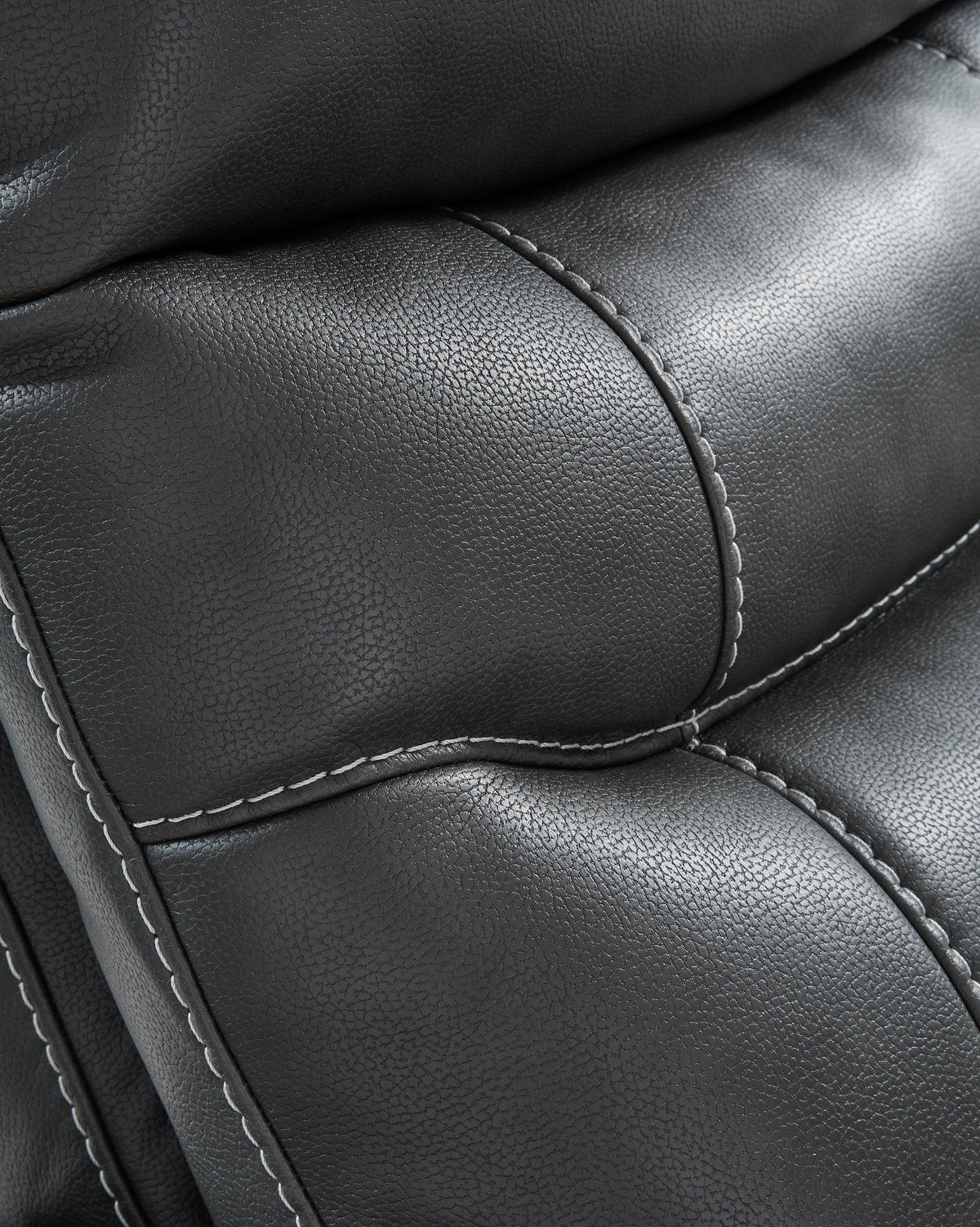 Ashley Furniture Strawbill Power Lift Recliner in plush fabric with padded armrests and a built-in power lift mechanism.