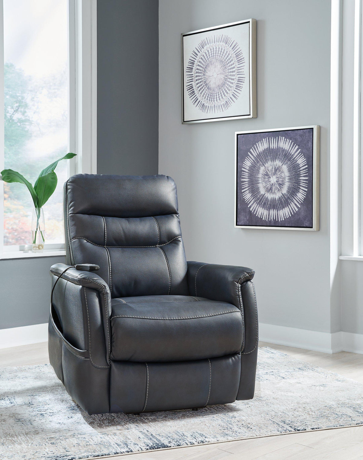 Ashley Furniture Strawbill Power Lift Recliner with plush upholstery and built-in control for easy reclining and lifting.