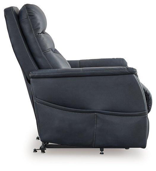 Ashley Furniture Strawbill Power Lift Recliner in beige fabric with plush cushioning and a built-in control panel for easy reclining.