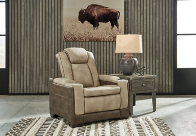 Ashley Furniture Next-Gen DuraPella power recliner in dark fabric, showing the closed recline position and plush cushioning.