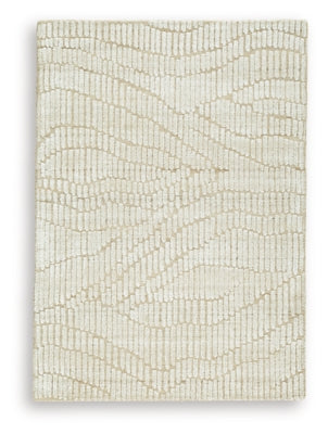 Ashley Furniture Jaseena area rug with intricate pattern and soft texture, perfect for enhancing living room decor.
