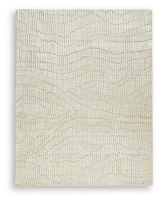 Ashley Furniture Jaseena area rug with intricate geometric patterns in neutral tones, perfect for living room or bedroom decor.