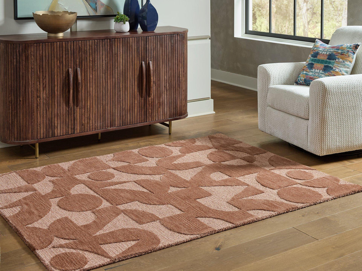 Ashley Furniture Perrenton Rug with intricate pattern, soft texture, and warm beige tones suitable for living room or bedroom decor.