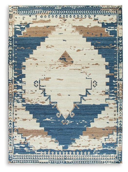 Ashley Furniture Varnler Rug with intricate woven pattern in neutral tones, perfect for enhancing living room décor.