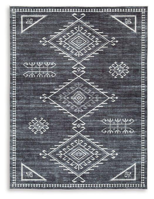 Ashley Furniture Arloman Rug with intricate pattern and warm tones, ideal for adding style to living room or bedroom floors.