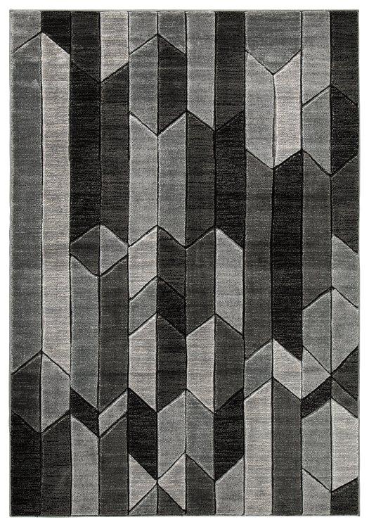 Ashley Furniture Chayse 6'6" x 9'6" rug with a modern geometric pattern in neutral tones.