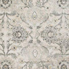 Ashley Furniture Kilkenny rug, 7'10" x 10'2", featuring intricate patterns and soft textures, perfect for living room decor.
