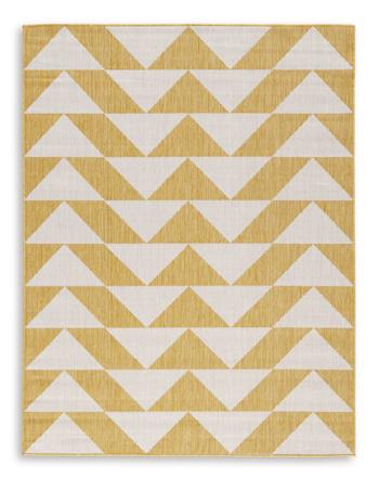 Ashley Furniture Thomley 5' x 7' rug featuring a soft, woven design in neutral tones, perfect for living room or bedroom decor.
