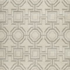Large Maconville rug by Ashley Furniture featuring a plush, textured surface with neutral tones for elegant home decor.
