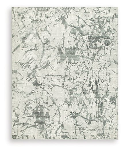 Medium Ashley Furniture Tobinbury washable area rug with a patterned design, ideal for living rooms and bedrooms.