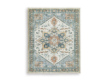 Medium Ashley Furniture Wallney Area Rug with intricate patterns in soft neutral tones, ideal for living room or bedroom decor.
