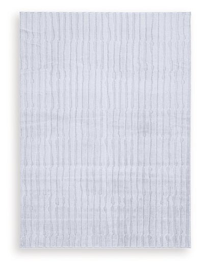 Medium washable area rug by Ashley Furniture with a textured design, perfect for living rooms and bedrooms.