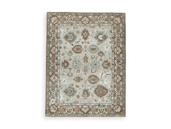 Ashley Furniture Ainswick Memory Foam Rug with plush texture and modern design, perfect for adding comfort to any room.