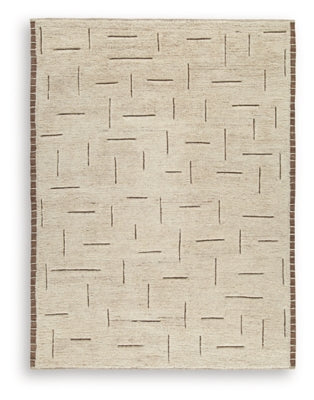 Ashley Furniture Clayman Rug featuring a textured, neutral-toned design suitable for living room or bedroom decor.