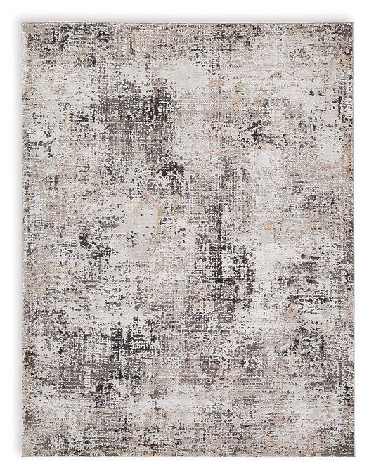 Medium Ashley Furniture Elaning rug with intricate pattern in neutral tones, showcasing soft woven texture and decorative border.