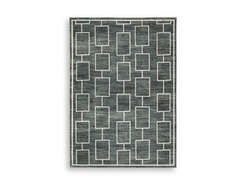 Ashley Furniture Elderland washable 5x7 medium area rug with a soft, patterned design suitable for living rooms or bedrooms.