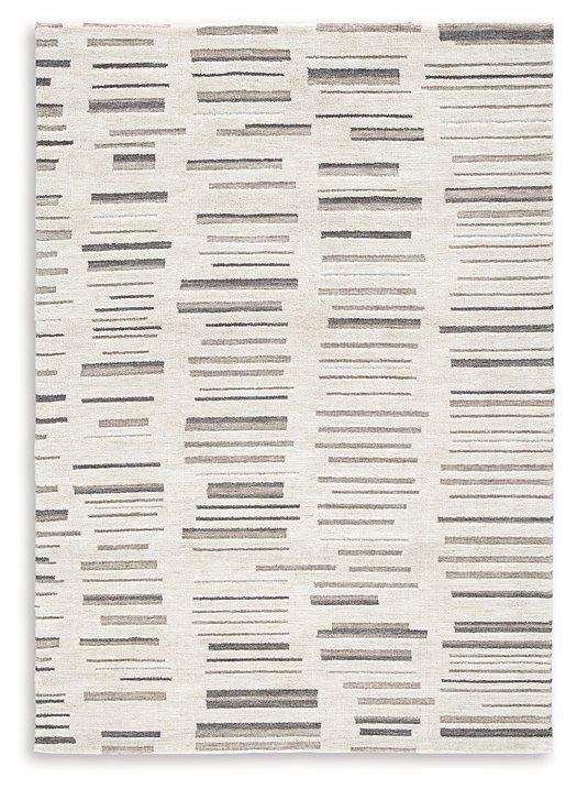 Medium Ashley Furniture Leesdale 5' x 7' rug with intricate patterns and soft texture, ideal for living rooms or bedrooms.