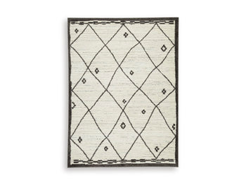 Ashley Furniture Fenriston Rug with intricate patterns in neutral tones, showcasing a plush, textured surface suitable for living rooms.