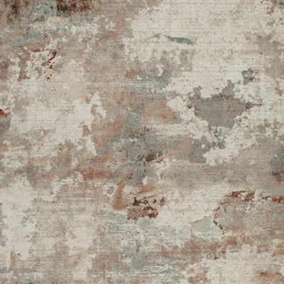 Swatch of Ashley Furniture Jadenburg Rug showcasing a textured, neutral-toned design suitable for living rooms or bedrooms