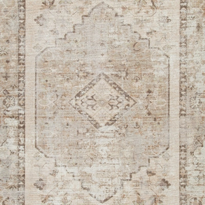 Swatch image of Ashley Furniture Livdon washable rug with a textured, neutral-toned pattern in beige and gray.