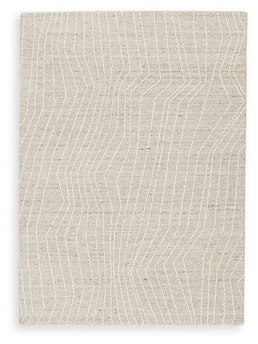 Medium Ashley Furniture Varahill Rug featuring a plush, textured design in neutral tones for cozy living spaces.