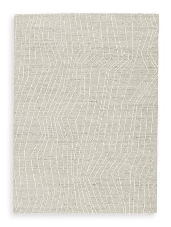Medium Ashley Furniture Varahill Rug with intricate woven pattern and neutral tones, ideal for living room or bedroom decor.