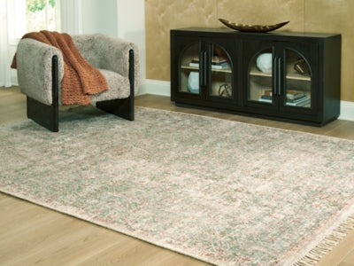 Ashley Furniture Rossbury Rug in a cropped view, featuring a textured design in neutral tones for living room or bedroom decor.