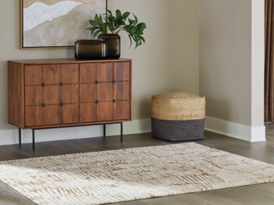 Ashley Furniture Uduak Rug in neutral tones, featuring intricate woven patterns, perfect for adding texture to living spaces.