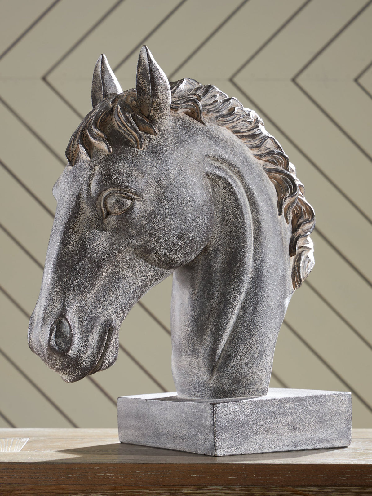Ashley Furniture Carnlow sculpture featuring a modern, abstract design with intricate detailing and a sleek finish.