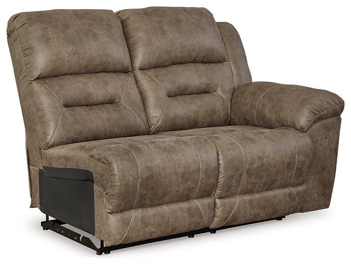 Ashley Furniture Ravenel Power Reclining Sectional with plush cushions and reclining seats in a modern living room setting.