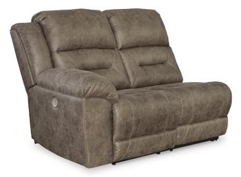 Ashley Furniture Ravenel Power Reclining Sectional in dark fabric with plush cushions and reclining features.