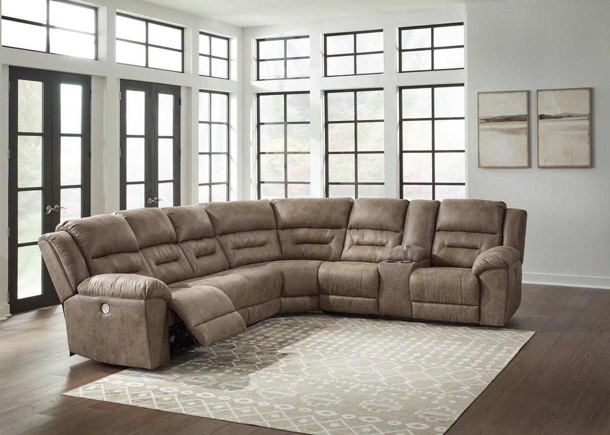 Ashley Furniture Ravenel power reclining sectional with plush cushions and wide chaise lounges, perfect for relaxing and entertaining.