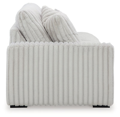 Ashley Furniture Stupendous Sectional sofa with plush cushions and modern design, shown in a cozy living room setting.