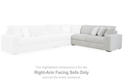 Ashley Furniture Stupendous Sectional sofa with plush cushions and modern design, shown in a cozy living room setting.