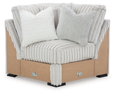 Ashley Furniture Stupendous sectional sofa with plush cushions and modern design, shown from a head-on view.