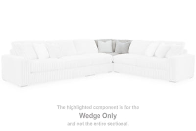 Ashley Furniture Stupendous Sectional sofa with plush cushions and modern design, shown in a stylish living room setting.