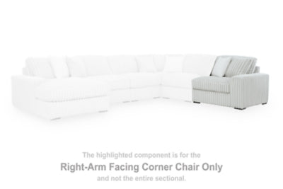 Ashley Furniture Stupendous Sectional sofa with plush cushions and modern design in a neutral fabric.