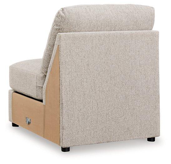 Ashley Furniture Ballyton Sectional sofa with plush cushions and neutral fabric upholstery in a modern living room setting.