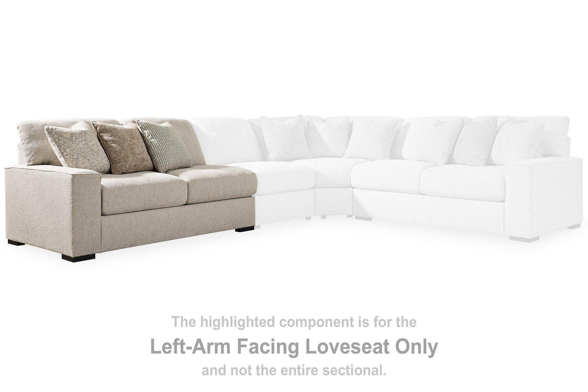 Ashley Furniture Ballyton sectional sofa with plush cushions and modern design, shown in a cozy living room setting.