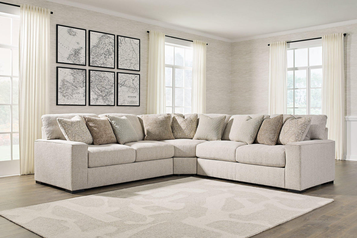 Ashley Furniture Ballyton Sectional with plush fabric upholstery and ample seating, ideal for modern living rooms.