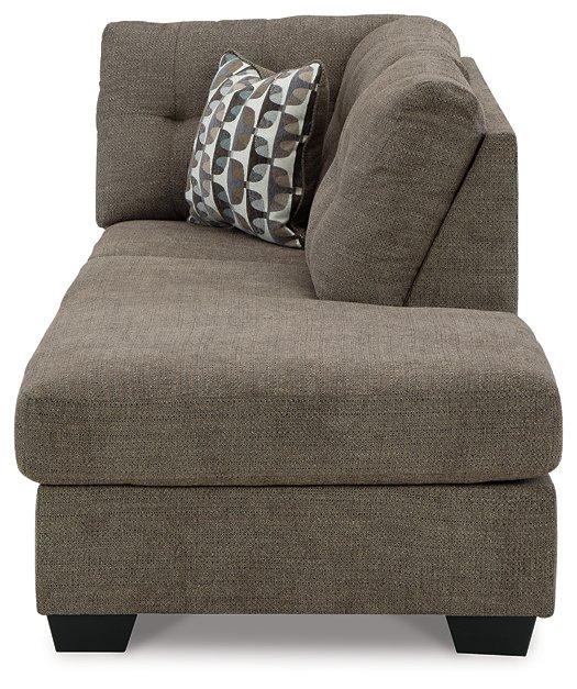 Ashley Furniture Mahoney 2-Piece Sleeper Sectional with chaise showing plush fabric and modern design in a living room setting.