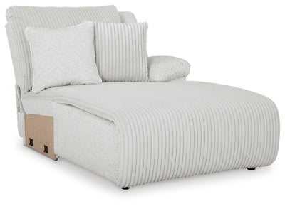 Ashley Furniture Top Tier reclining sectional sofa with chaise, featuring plush cushions and a modern design, viewed from an angle.