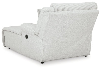 Ashley Furniture Top Tier reclining sectional sofa with chaise, showing plush cushions and reclining feature from the back view.