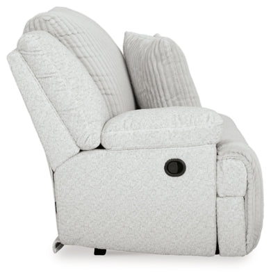 Ashley Furniture Top Tier reclining sectional sofa with chaise, featuring plush cushions and modern design.